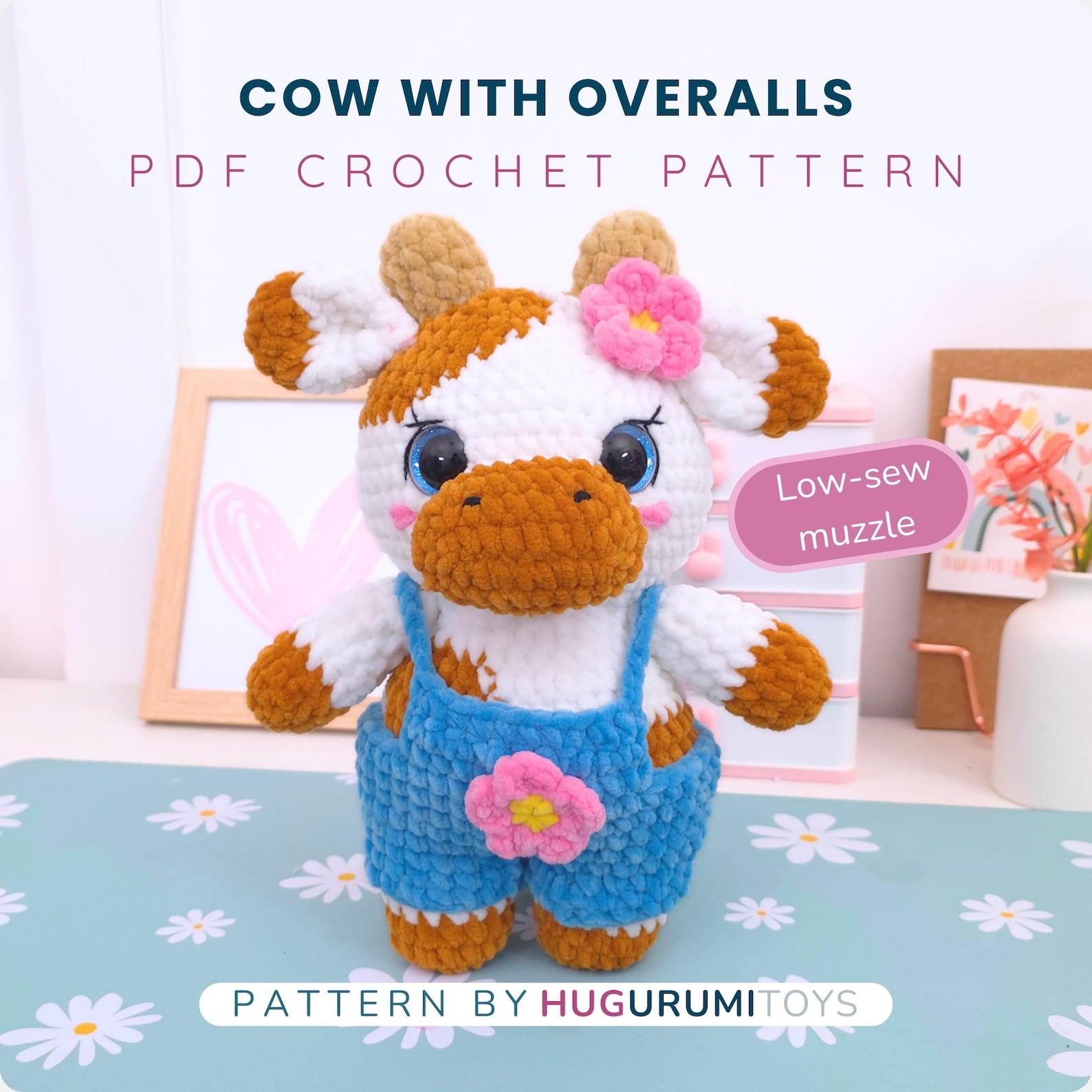 Amigurumi crochet cow wearing blue overalls sitting on a white background